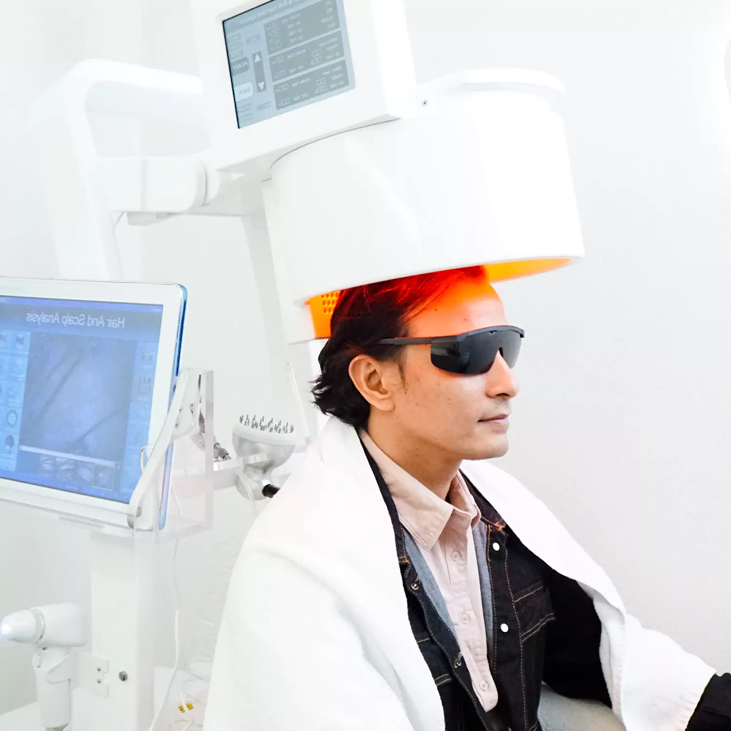 How Laser Hair Treatment Can Regrow Thinning Hair 2 Laser Hair Regrowth treatment using low-level laser therapy (LLLT) on the scalp to stimulate hair follicles and promote natural hair growth
